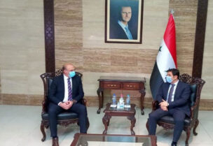 Health Minister Hamad Hassan during his visit to Syria