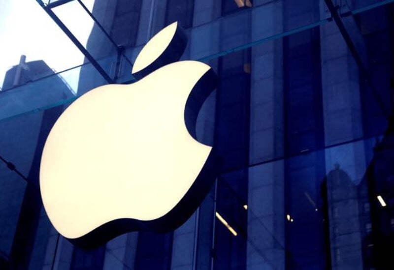 FILE PHOTO: The Apple Inc logo is seen hanging at the entrance to the Apple store on 5th Avenue in Manhattan, New York, U.S., October 16, 2019.