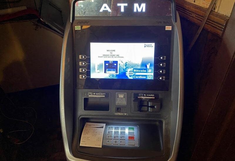 FILE PHOTO: A LibertyX Bitcoin ATM is seen at the Grassy Point Bar & Grill in Broad Channel, New York, U.S. March 8, 2021.