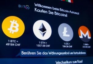 The exchange rates and logos of Bitcoin (BTH), Ether (ETH), Litecoin (LTC) and Monero (XMR) are seen on the display of a cryptocurrency ATM of blockchain payment service provider Bity at the House of Satochi bitcoin and blockchain shop in Zurich, Switzerland March 4, 2021.