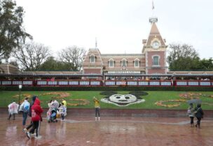 FILE PHOTO: A general view of the entrance of Disneyland theme park in Anaheim, California, U.S., March 13, 2020.