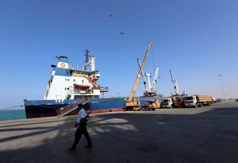 FILE PHOTO: A coast guard walks past a ship docked at the Red Sea port of Hodeidah, Yemen January 5, 2019. Picture taken January 5, 2019