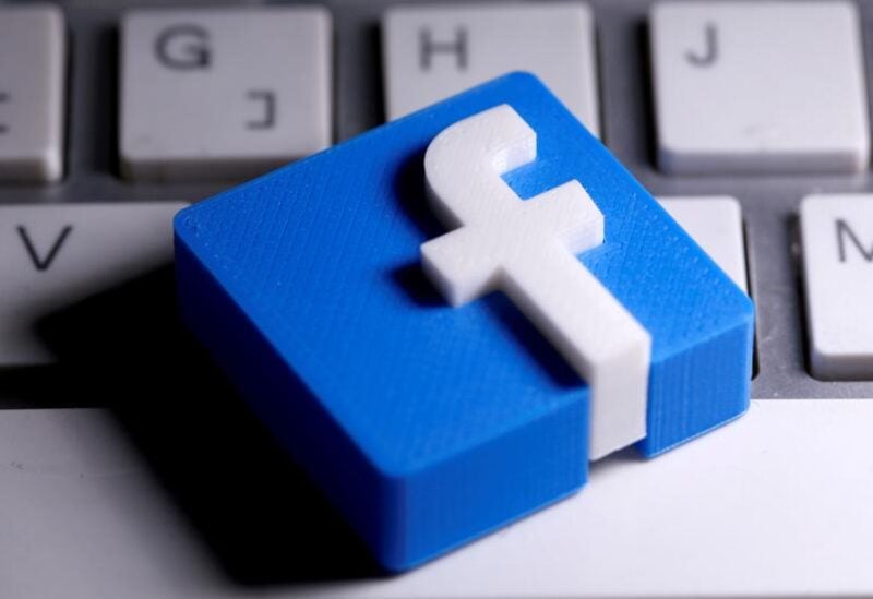 FILE PHOTO: A 3D-printed Facebook logo is seen placed on a keyboard in this illustration taken March 25, 2020.