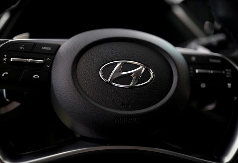 FILE PHOTO: The logo of Hyundai Motors is seen on a steering wheel on display at the company's headquarters in Seoul, South Korea, March 22, 2019.