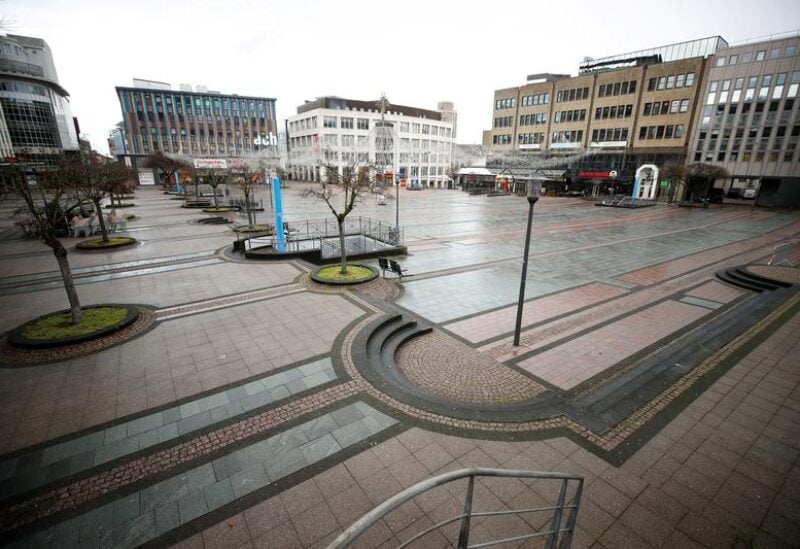 FILE PHOTO: Picture shows the abandoned Kennedy Square due to the coronavirus disease (COVID-19) pandemic lockdown in downtown Essen, Germany, March 11, 2021.