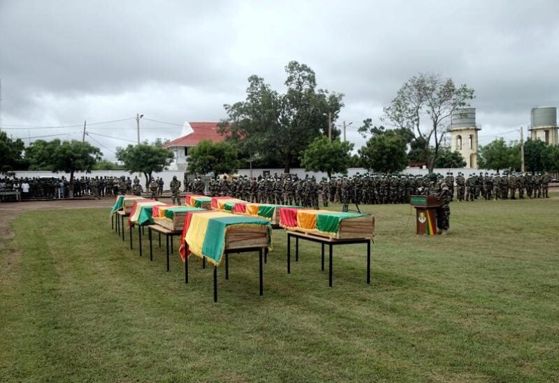 FILE PHOTO: A view of flag-draped coffins of Malian soldiers, that the army said were killed in militant attacks in Gueri town, during an honour ceremony at the army headquarters in Kati, Mali September 6, 2020.