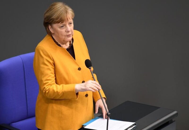 FILE PHOTO: German Chancellor Angela Merkel answers questions during a plenum session of the lower house of parliament, the Bundestag, in Berlin, Germany, March 24, 2021.