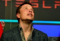 FILE PHOTO: CEO of Tesla Motors Elon Musk reacts following the company's initial public offering at the NASDAQ market in New York June 29, 2010.