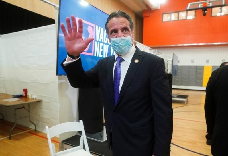 FILE PHOTO: New York Governor Andrew Cuomo waves goodbye as he departs an event, amid the coronavirus disease (COVID-19) pandemic, in the Bronx borough of New York City, New York, U.S., March 26, 2021.