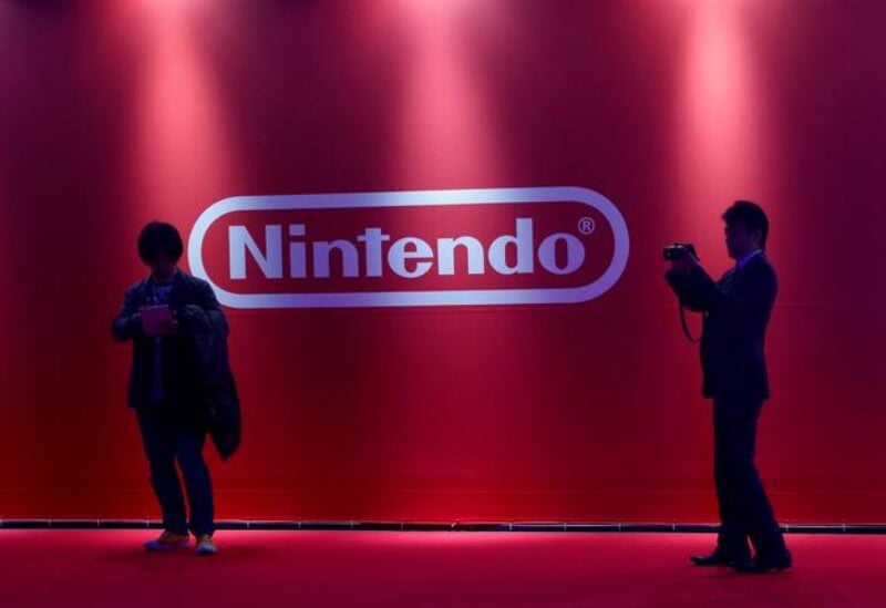 FILE PHOTO: People stand in front of Nintendo's logo in Tokyo, Japan January 13, 2017.