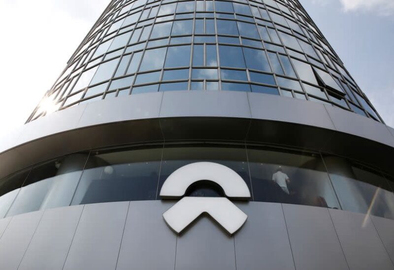 FILE PHOTO: A logo of the electric vehicle maker NIO is seen at its store in Beijing, China August 20, 2020.