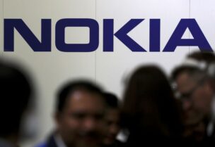 FILE PHOTO: Visitors gather outside the Nokia booth at the Mobile World Congress in Barcelona, Spain, February 26, 2019.