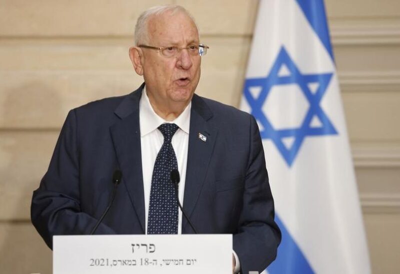 FILE PHOTO: Israel's President Reuven Rivlin speaks during a joint news conference with French President Emmanuel Macron, after a working lunch, at the Elysee Palace in Paris, France March 18, 2021.