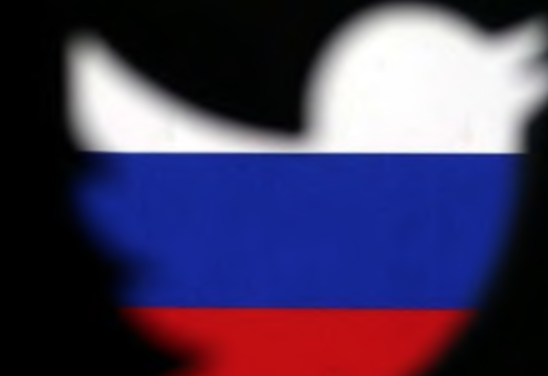FILE PHOTO: A 3D-printed Twitter logo displayed in front of Russian flag is seen in this illustration picture, October 27, 2017.