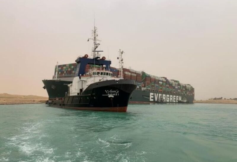 A container ship which was hit by strong wind and ran aground is pictured in Suez Canal, Egypt March 24, 2021.