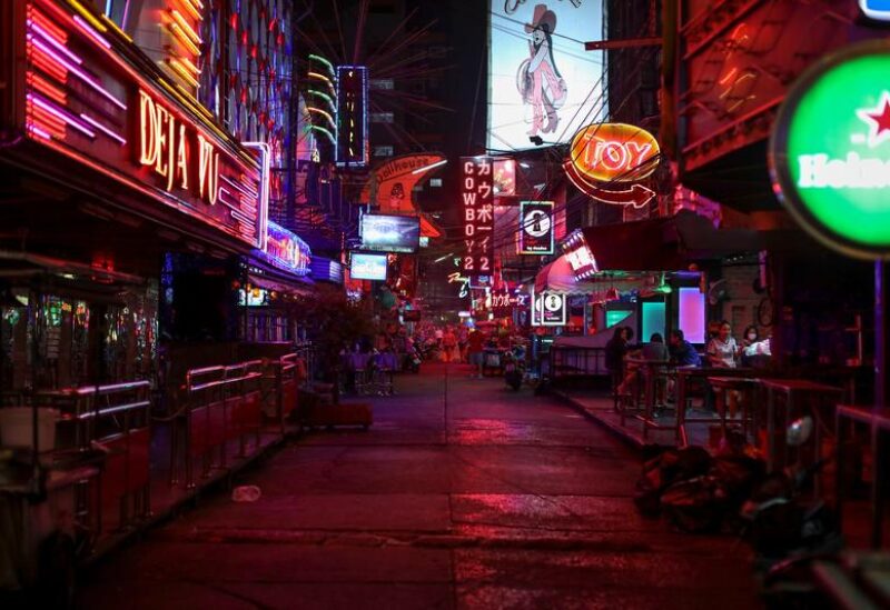 FILE PHOTO: Night clubs and go-go bars street Soi Cowboy is seen empty after Thai government ordered the closure of cinemas, bars and other entertainment facilities as part of a raft of measures intended to control the spread of the coronavirus disease (COVID-19) outbreak in Bangkok, Thailand March 18, 2020.