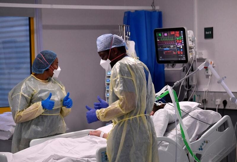 FILE PHOTO: Nurses react as they treat a COVID-19 patient in the ICU (Intensive Care Unit) at Milton Keynes University Hospital, amid the spread of the coronavirus disease (COVID-19) pandemic, Milton Keynes, Britain, January 20, 2021.