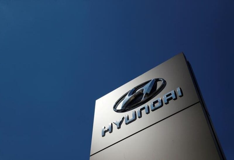 FILE PHOTO: A shop sign of Hyundai is seen outside a car showroom in Bletchley, Milton Keynes, Britain, May 31, 2020.