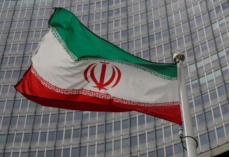 FILE PHOTO: An Iranian flag flutters in front of the International Atomic Energy Agency (IAEA) headquarters in Vienna, Austria September 9, 2019.