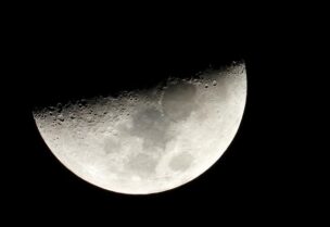 FILE PHOTO: Moon is seen in the sky during the closest visible conjunction of Jupiter and Saturn in 400 years, in Tejeda, on the island of Gran Canaria, Spain December 21, 2020.