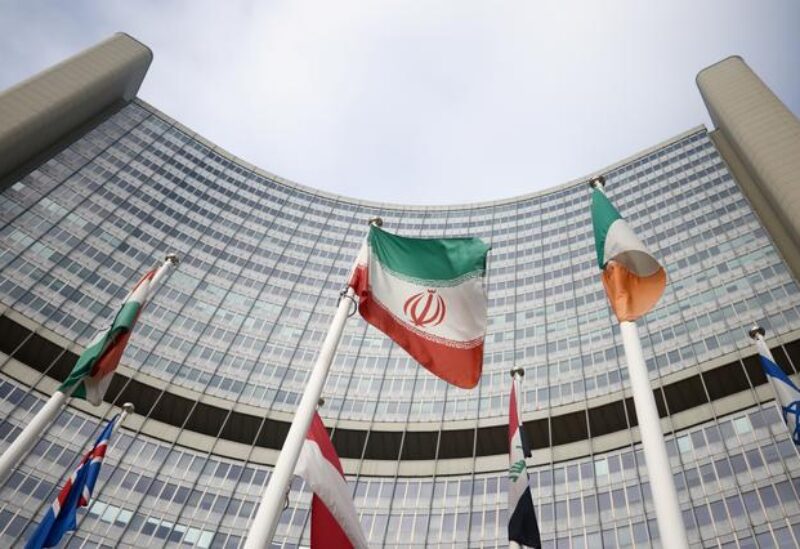 FILE PHOTO: The Iranian flag waves in front of the International Atomic Energy Agency (IAEA) headquarters, amid the coronavirus disease (COVID-19) outbreak in Vienna, Austria, March 1, 2021.