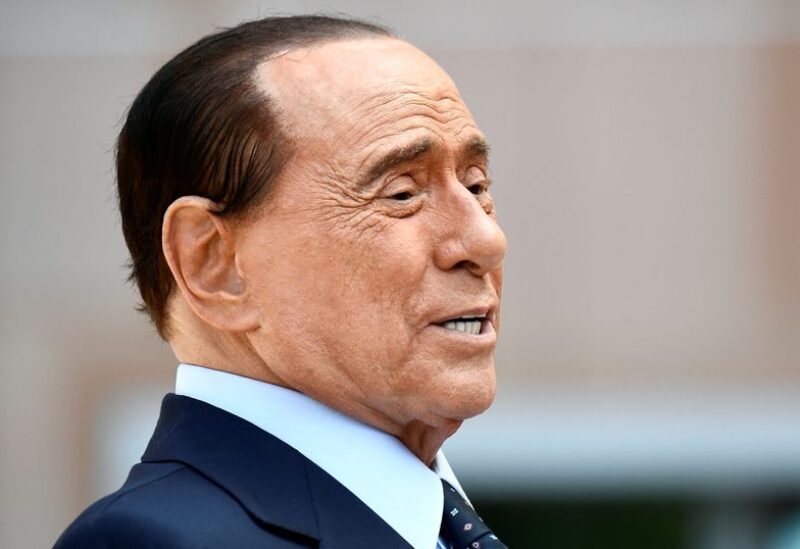 FILE PHOTO: Former Italian Prime Minister Silvio Berlusconi speaks to the media as he leaves Milan's San Raffaele hospital, where he was being treated after testing positive for the coronavirus disease (COVID-19) and diagnosed with mild pneumonia, in Milan, Italy, September 14, 2020.