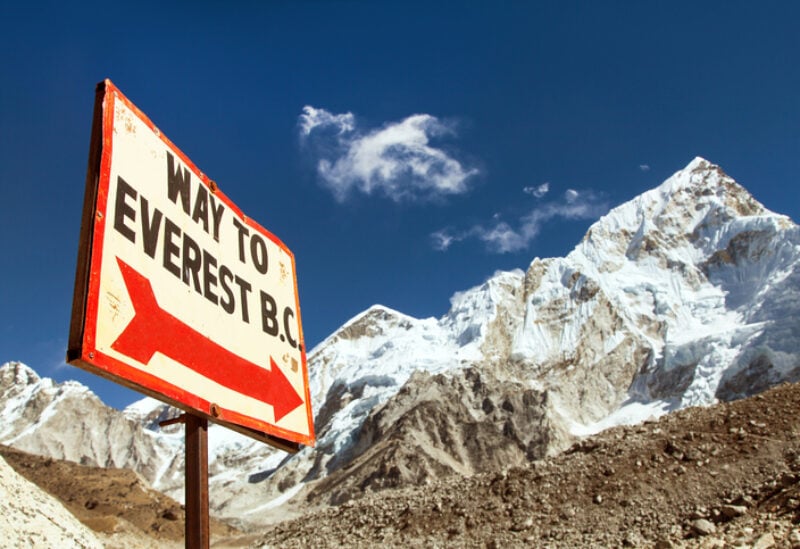 Nuptse peak near Gorak Shep village and signpost - Way to Everest base camp - Khumbu valley, Solukhumbu, Nepal Himalayas mountains