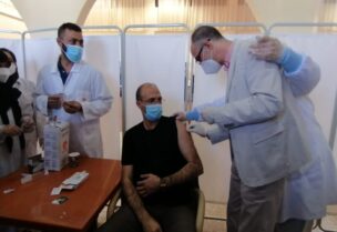 Hamad hassan receiving Astrazanica vaccine
