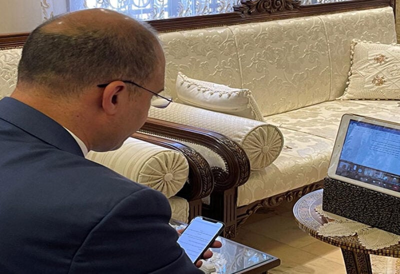 Health Minister Hamad Hassan during a virtual meeting