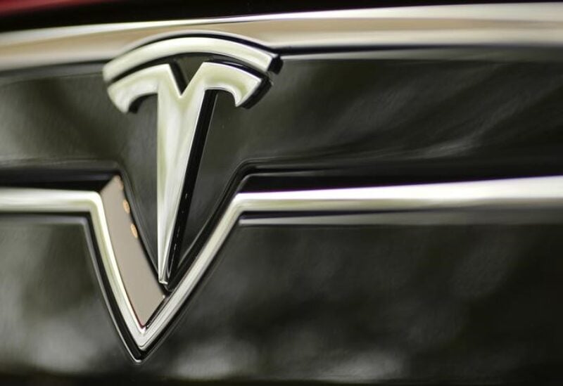 A Tesla Motors logo is shown on a Tesla Model S at a Tesla Motors dealership at Corte Madera Village, an outdoor retail mall, in Corte Madera