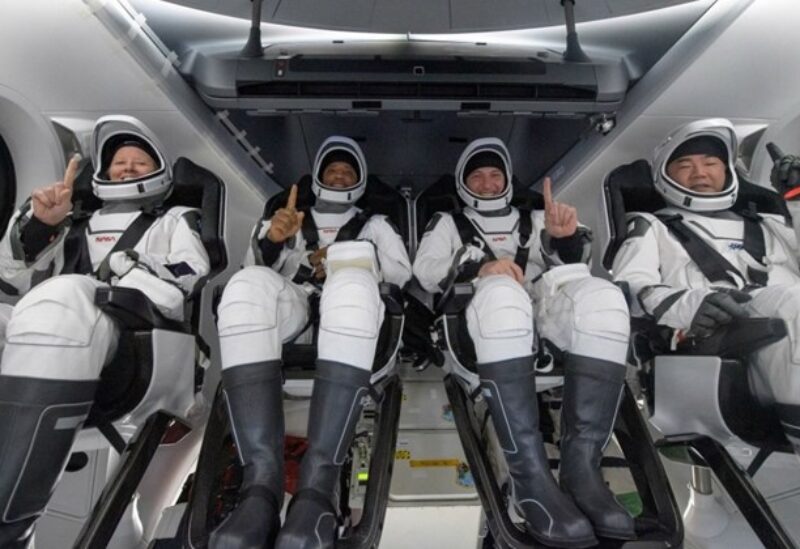 NASA astronauts Shannon Walker, Victor Glover, Mike Hopkins, and Japan Aerospace Exploration Agency astronaut Soichi Noguchi