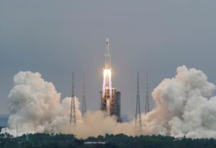 FILE PHOTO: The Long March-5B Y2 rocket, carrying the core module of China's space station Tianhe, takes off from Wenchang Space Launch Center in Hainan province, China April 29, 2021. China Daily via REUTERS