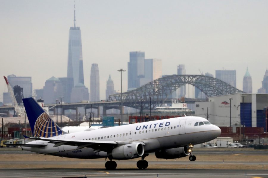 FILE PHOTO: A United Airlines passenger jet takes off with New York City as a backdrop, at Newark Liberty International Airport, New Jersey, U.S. December 6, 2019. REUTERS/Chris Helgren