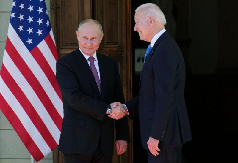 Biden, Putin shaking hands