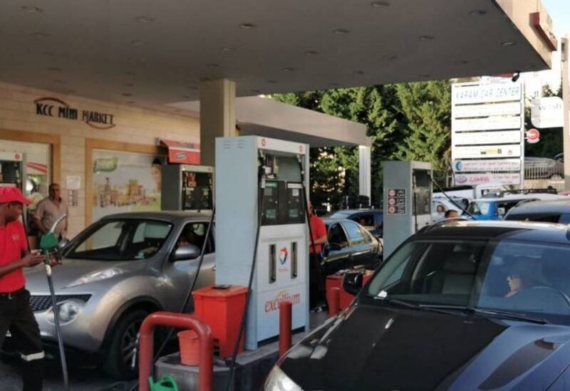 Cars queues in front of a gas station