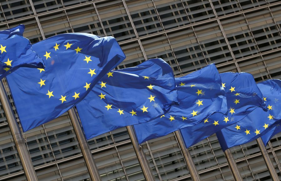 FILE PHOTO: European Union flags flutter outside the EU Commission headquarters in Brussels, Belgium May 5, 2021. REUTERS/Yves Herman/File Photo