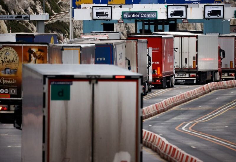 Lorries queue in at the border control of the Port of Dover in Dover, Britain, January 15, 2021. REUTERS/John Sibley/File Photo