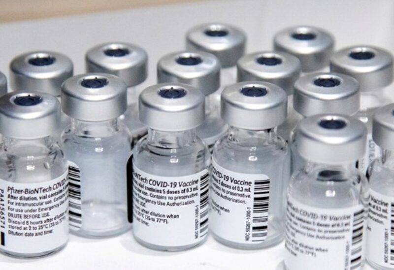 FILE PHOTO: Empty vials of the Pfizer-BioNTech coronavirus disease (COVID-19) vaccine are seen at The Michener Institute, in Toronto, Canada January 4, 2021. REUTERS/Carlos Osorio/File Photo