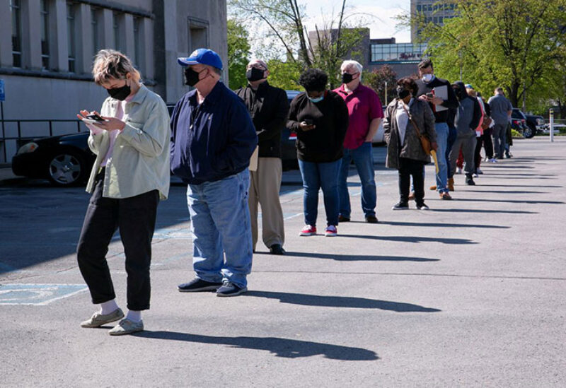 People line up for in-person appointments in Louisville, U.S