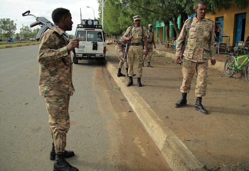 Members of Amhara Special Forces stand guard along a street in Humera town, Ethiopia, on July 1, 2021. (Reuters)