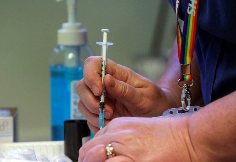 View of the Pfizer/BioNtech COVID-19 vaccine injections at GP-led clinic in Chalfont St Peter, Buckinghamshire, as hundreds of vaccination centres run by local doctors begin opening across England December 14, 2020. (Reuters)