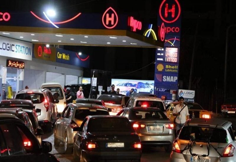 Cars queues in front of a gas station