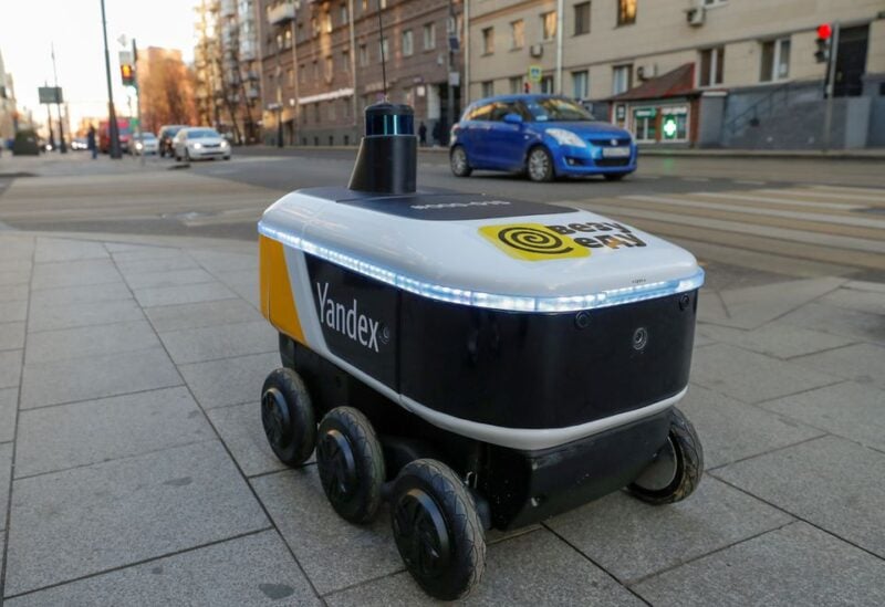 Yandex.Rover, a driverless robot for delivering hot restaurant meals, is seen at a business district in Moscow, Russia December 10, 2020. REUTERS/Evgenia Novozhenina