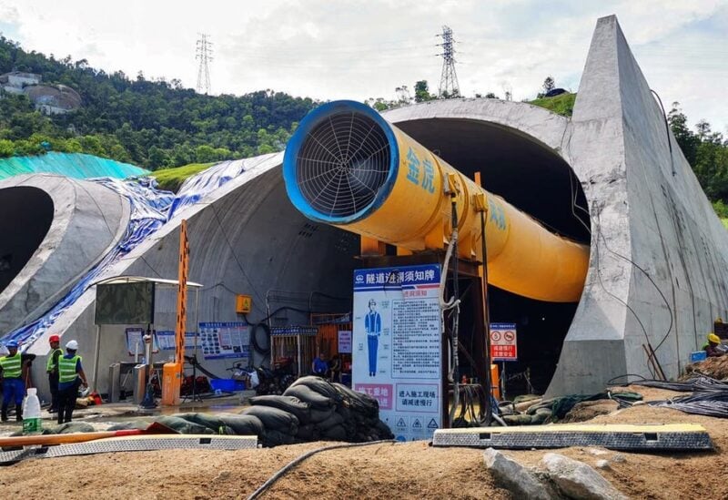 Rescuers work to clear a flooded tunnel after 14 construction workers were trapped in an underground section of a new highway construction site after it collapsed in Zhuhai in China's southern Guangdong province on July 16, 2021. (File photo: AFP)
