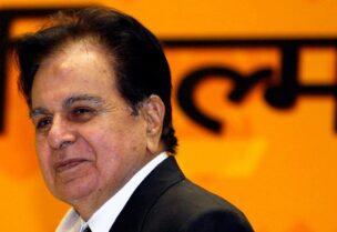 Bollywood star Dilip Kumar smiles after receiving a lifetime achievement award from India's President Pratibha Patil (unseen) during the 54th national film awards ceremony in New Delhi, on September 2, 2008. (REuters)