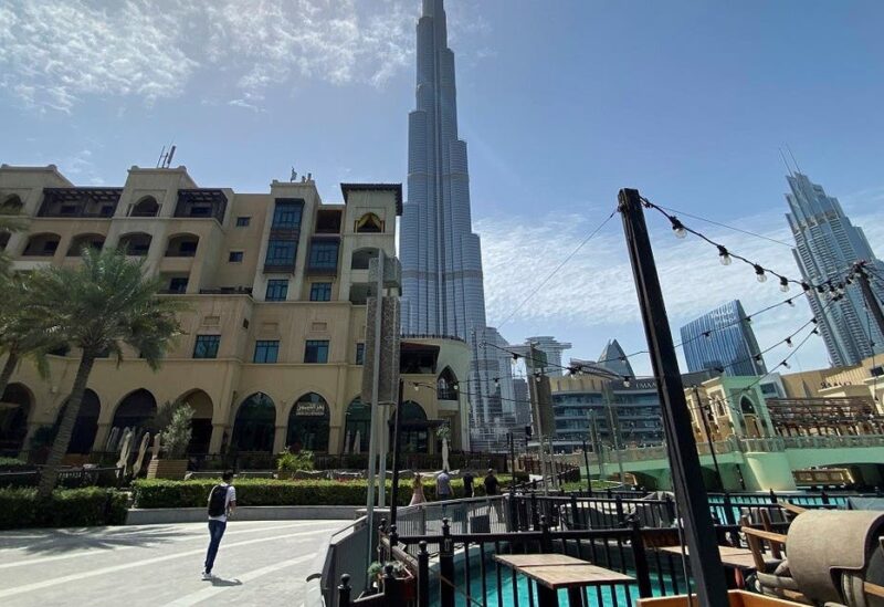 People walk outside Dubai mall after the UAE government eased a curfew and allowed stores to open, following the outbreak of the coronavirus disease (COVID-19) in Dubai. (Reuters)