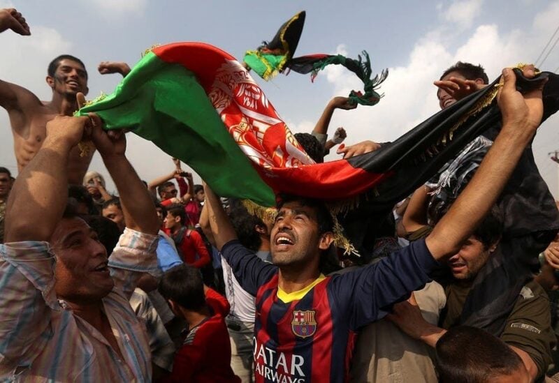 Afghan football fans celebrate winning the South Asian Football Federation championship after their team defeated India during the final match, in the streets of Kabul, Afghanistan, on September 12, 2013. (Reuters)