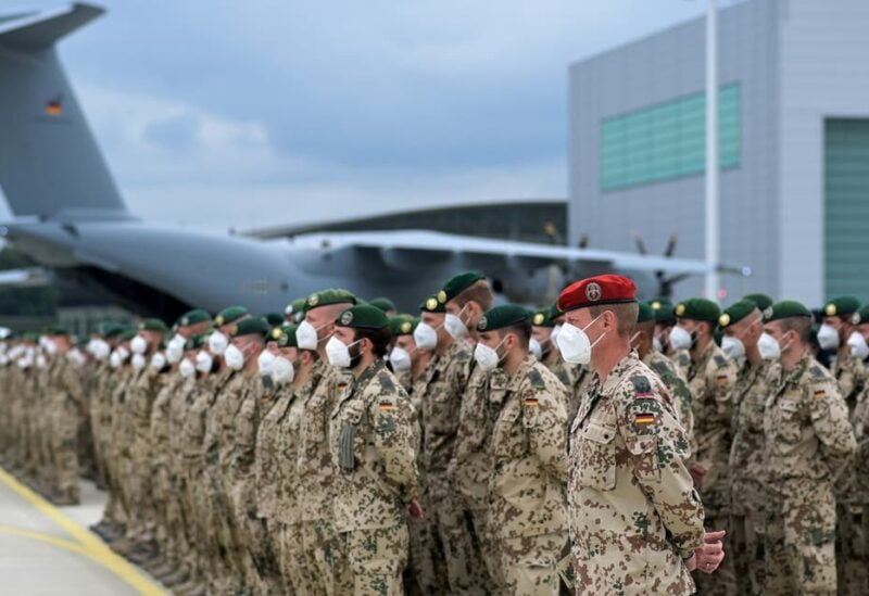 German soldiers line up for the final roll call in front of an German armed forces Bundeswehr Airbus A400M cargo plane after returning from Afghanistan at the airfield in Wunstorf, Germany, June 30, 2021. (File photo: Reuters)