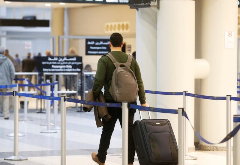 Habib Rahhal, 28, carries his luggage as he heads to board a plane to Germany, at Beirut international airport, Lebanon February 12, 2020. (File photo: Reuters)