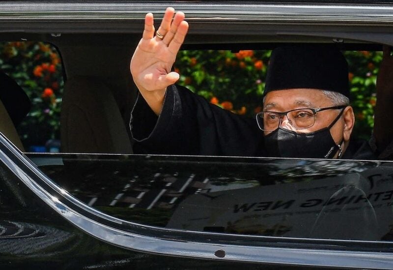 Malaysia’s incoming PM Ismail Sabri Yaakob waving as he leaves his house on the way to taking the oath of office to become the country’s new leader in Kuala Lumpur, August 21, 2021. (Famer Roheni/Malaysia’s Department of Information/AFP)